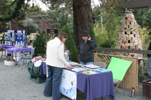 Maria Kelly works the WH2O table.