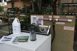 Close-up of washing machine hook-up for graywater use.