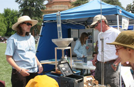 Courtney Howard, SLO County Engineer, explains testing equipment for measuring rainfall 